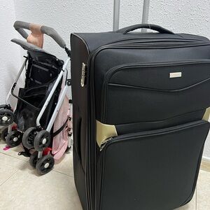 Black Suitcase with Gold Accents